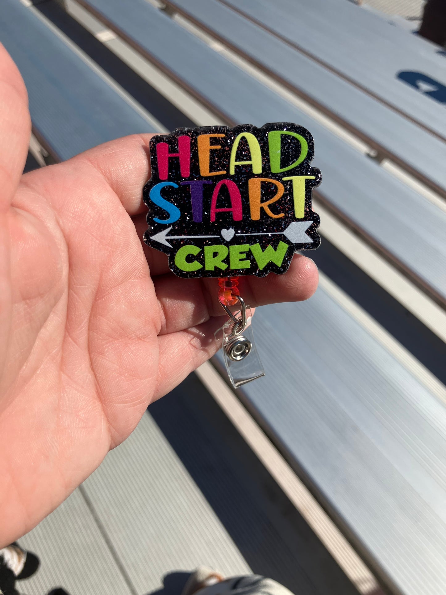 Head start crew badge reel