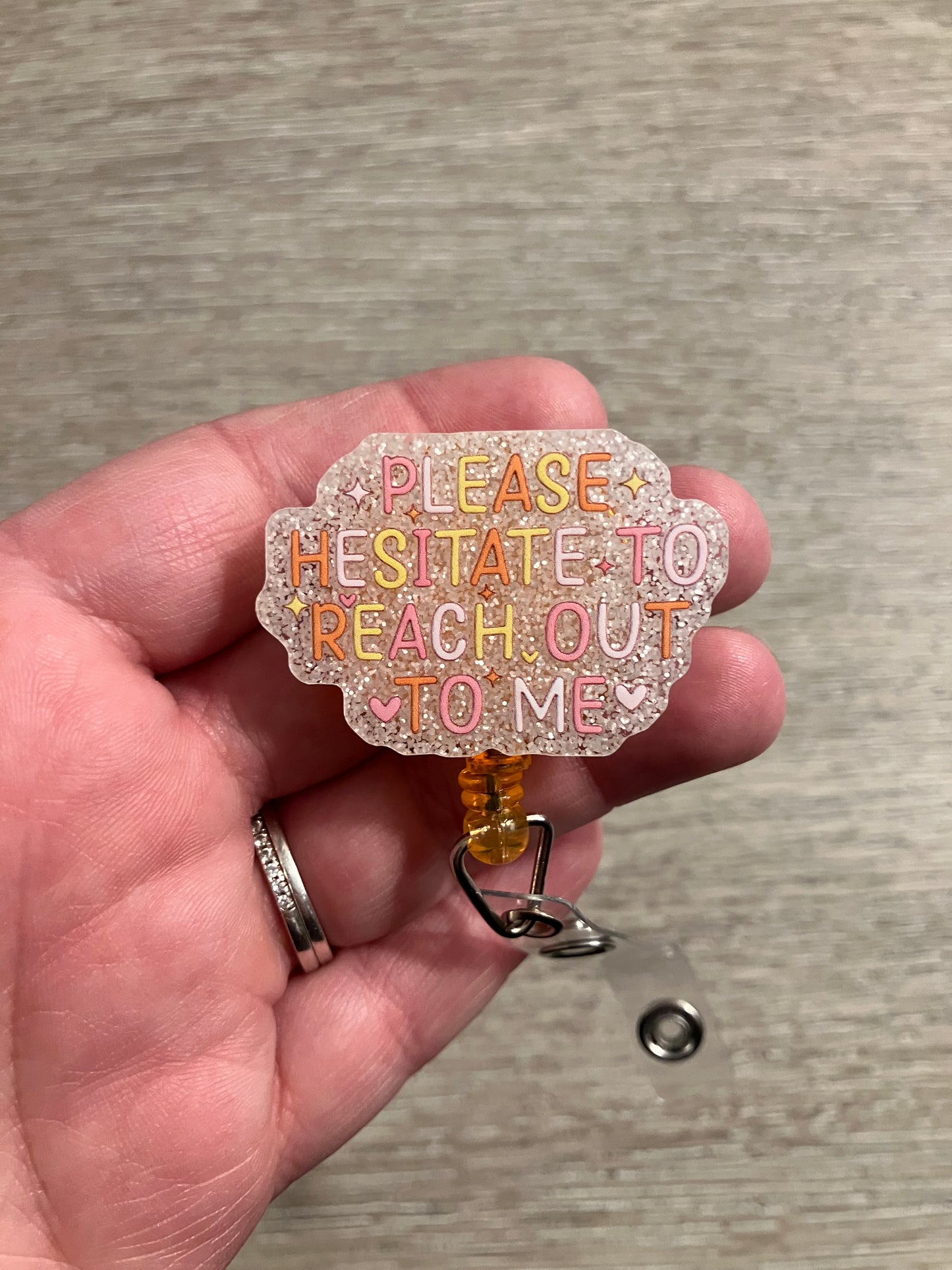 Please hesitate to reach of to me badge reel