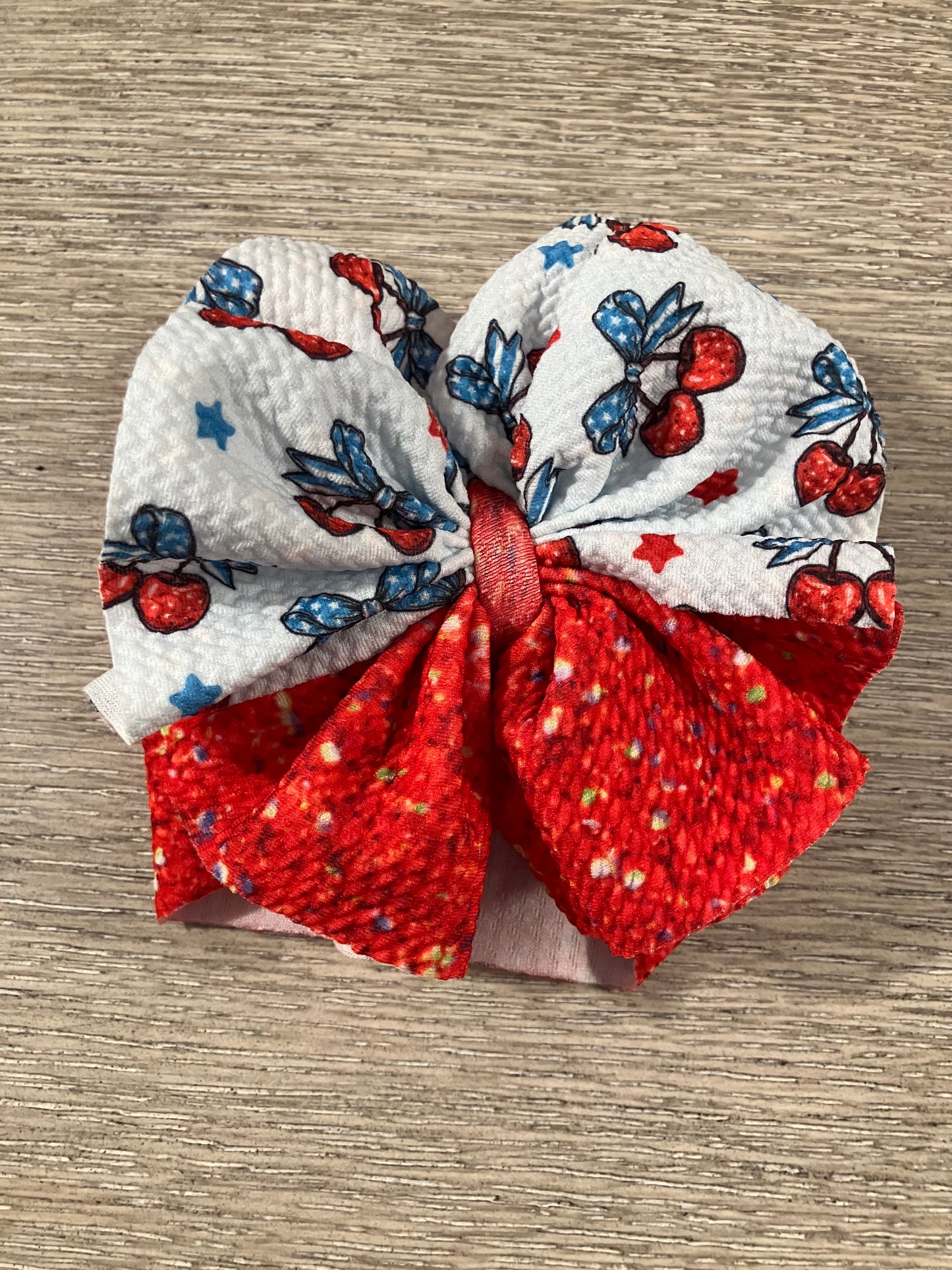 Cherry and faux red gutter newborn bow wrap