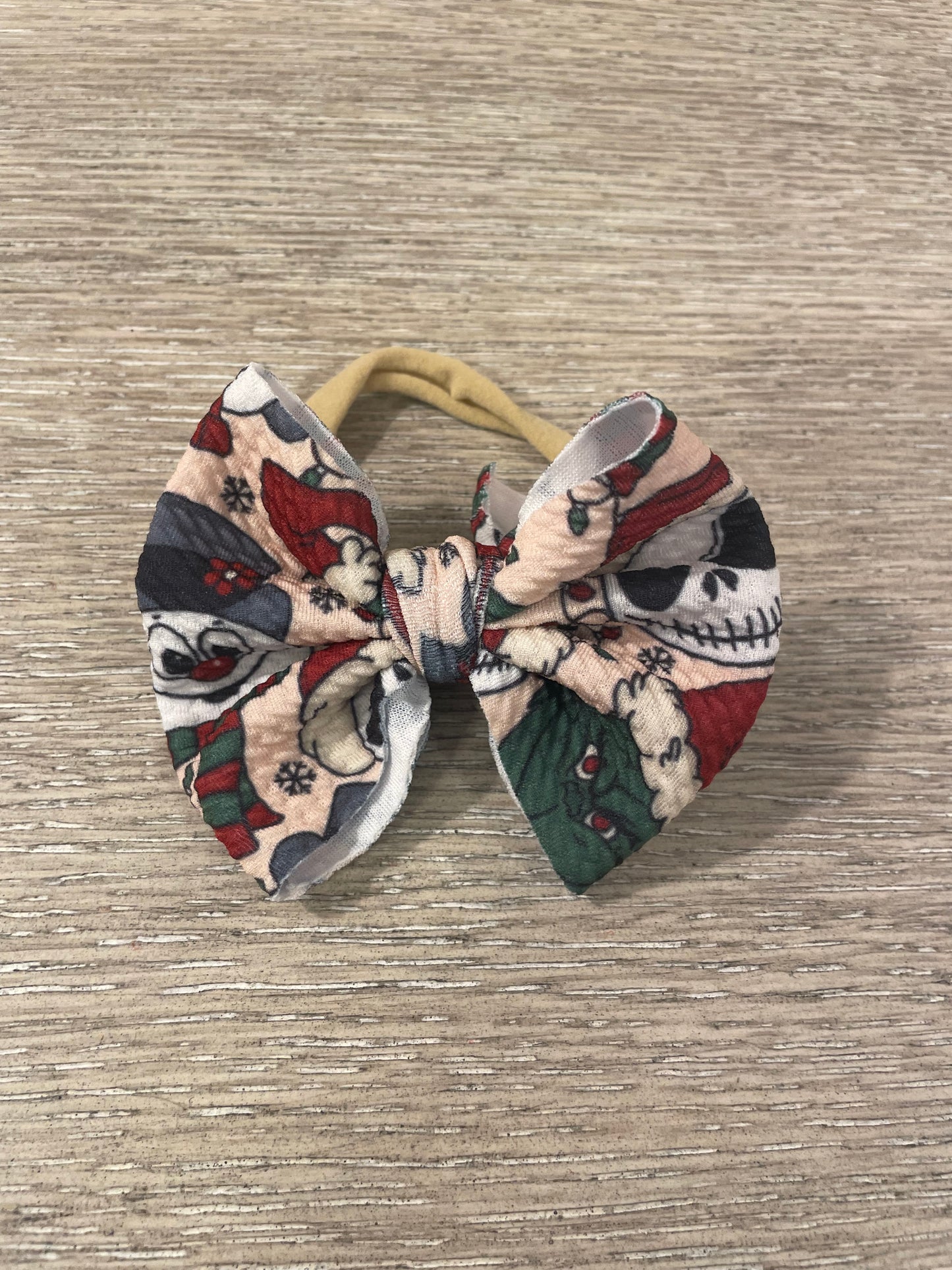 NBC mean guy snowman nylon bow