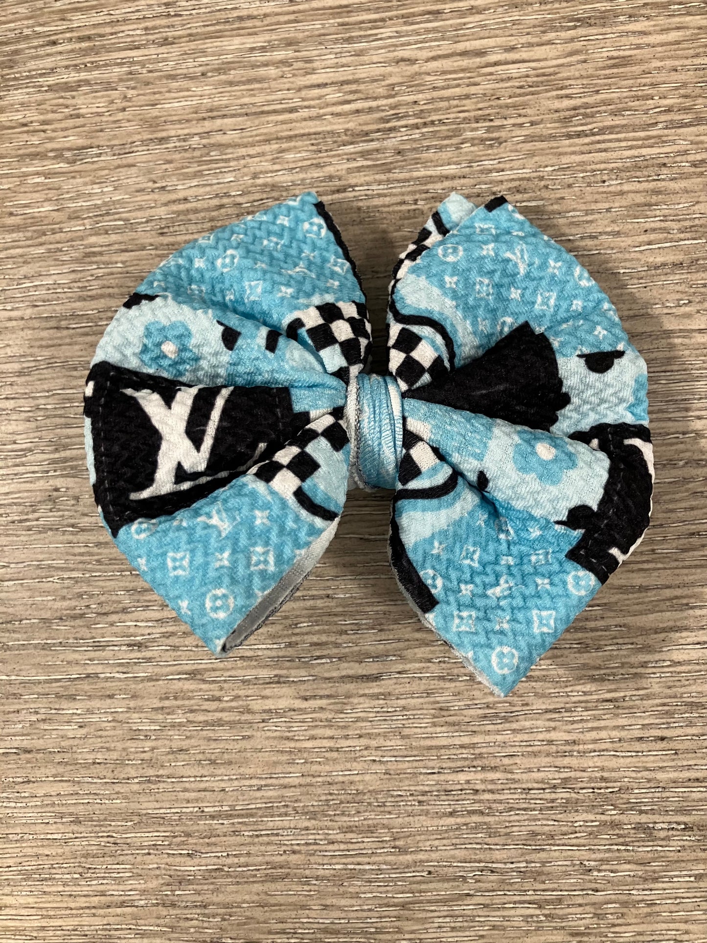 Light blue high end clip bow