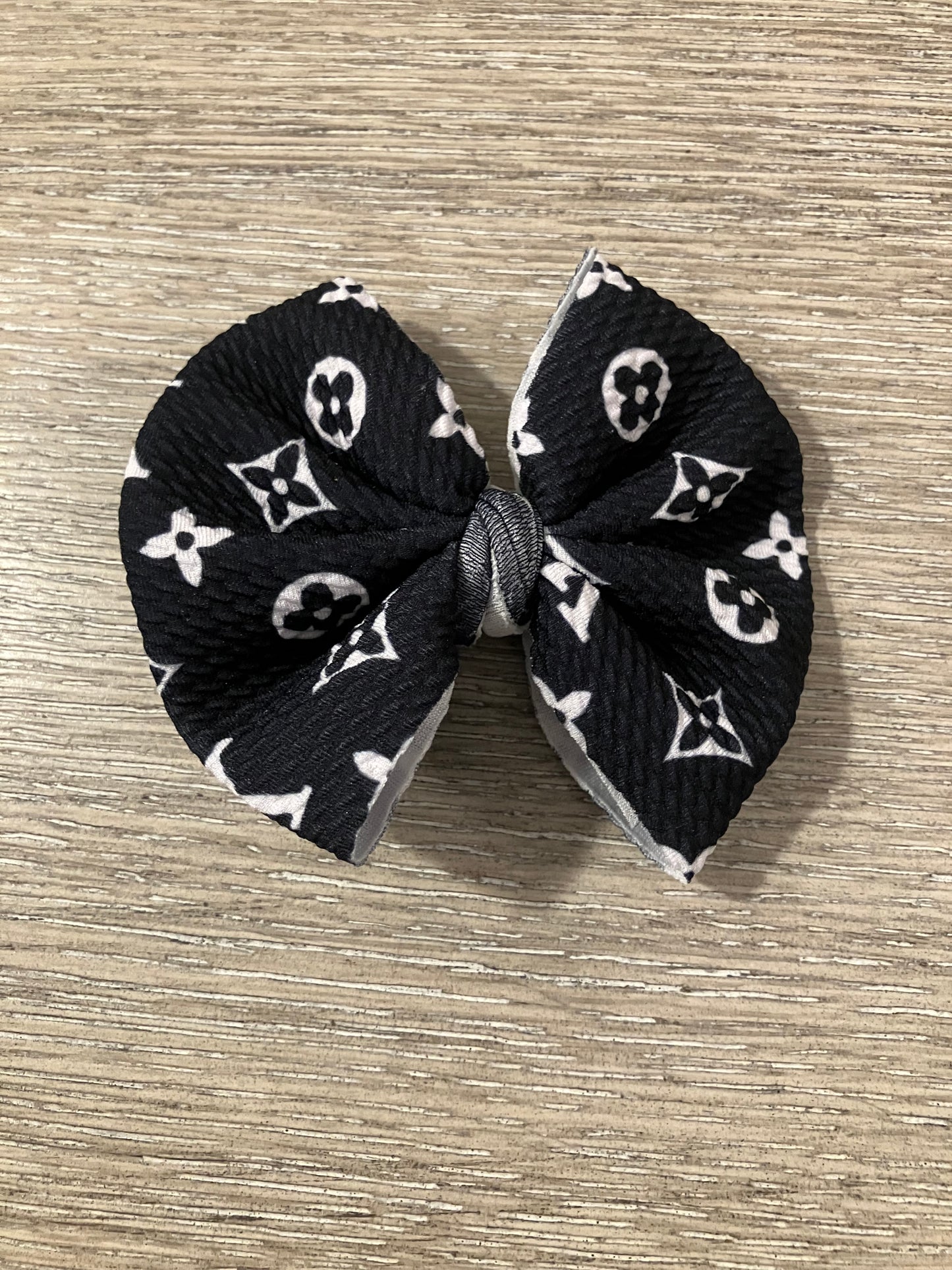 Black high end clip bow