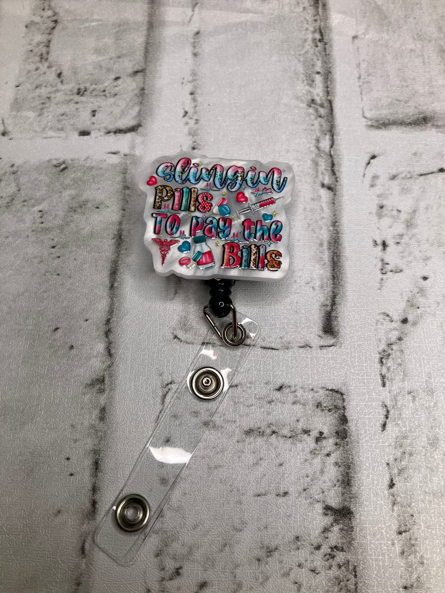 Slinging pills to pay the bills badge reel