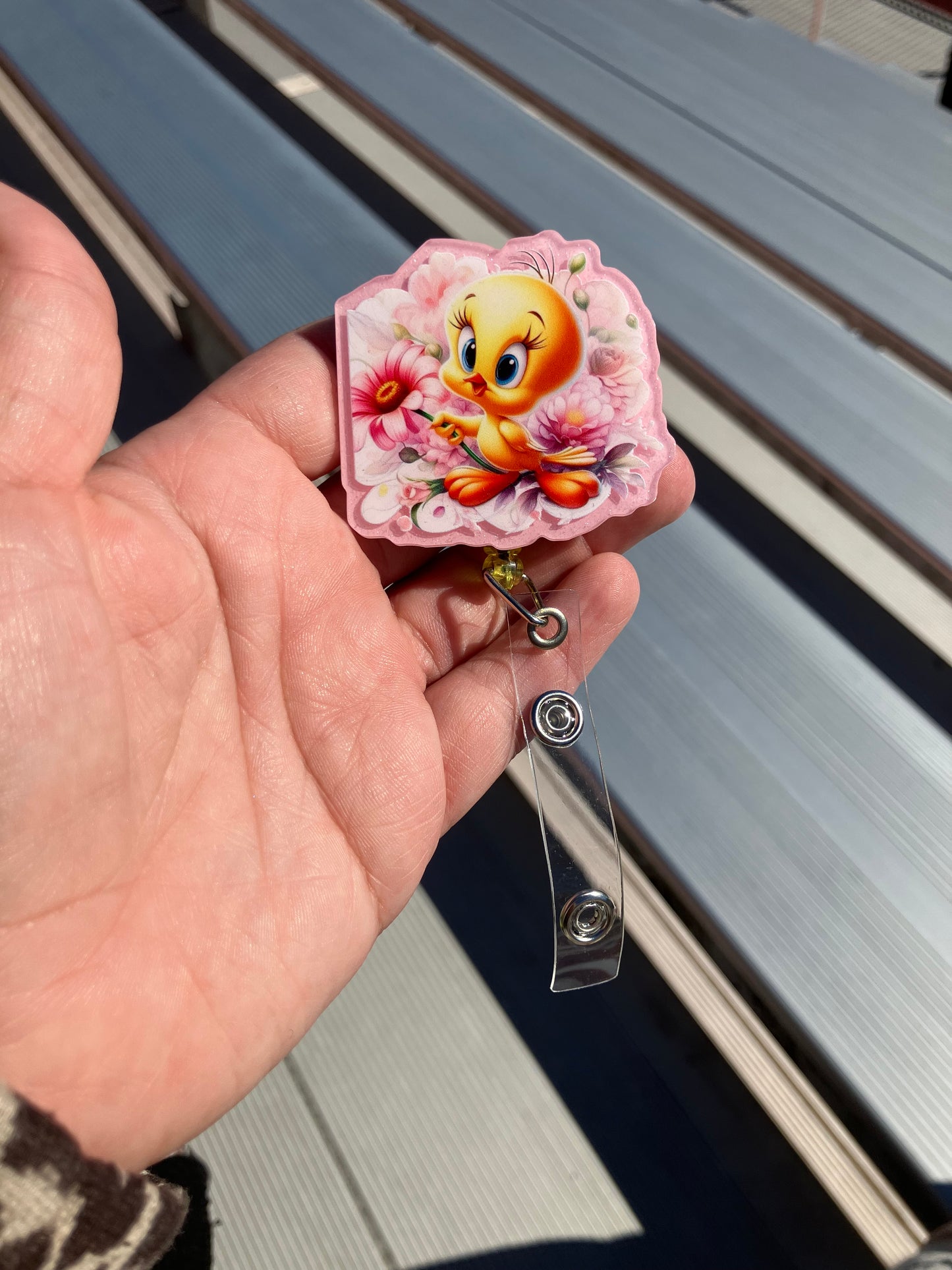 Yellow bird badge reel