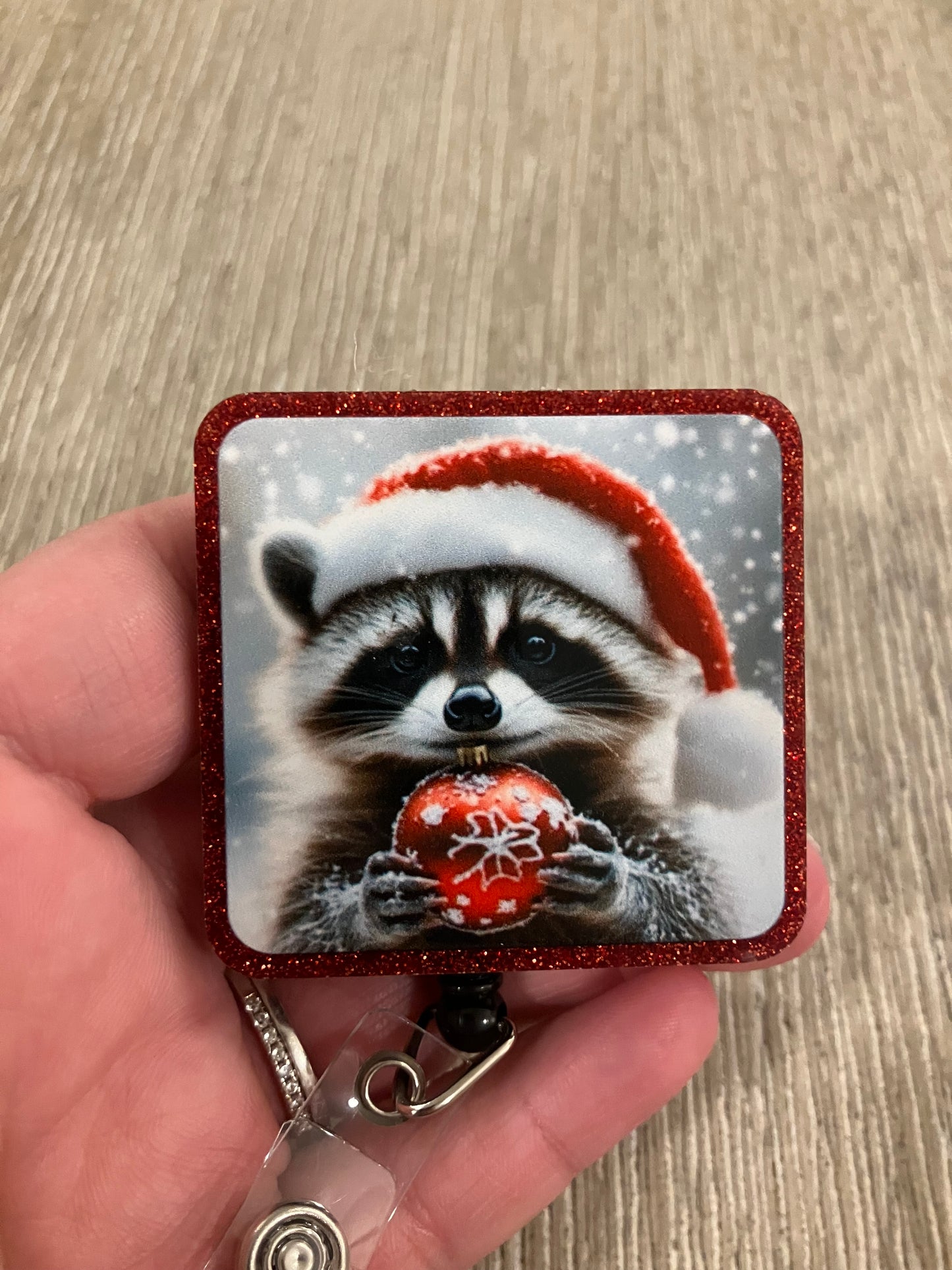 Christmas raccoon badge reel