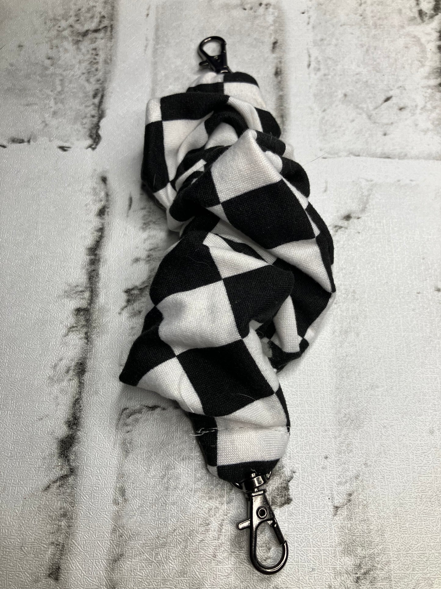 Black checkered scrunchie phone holder