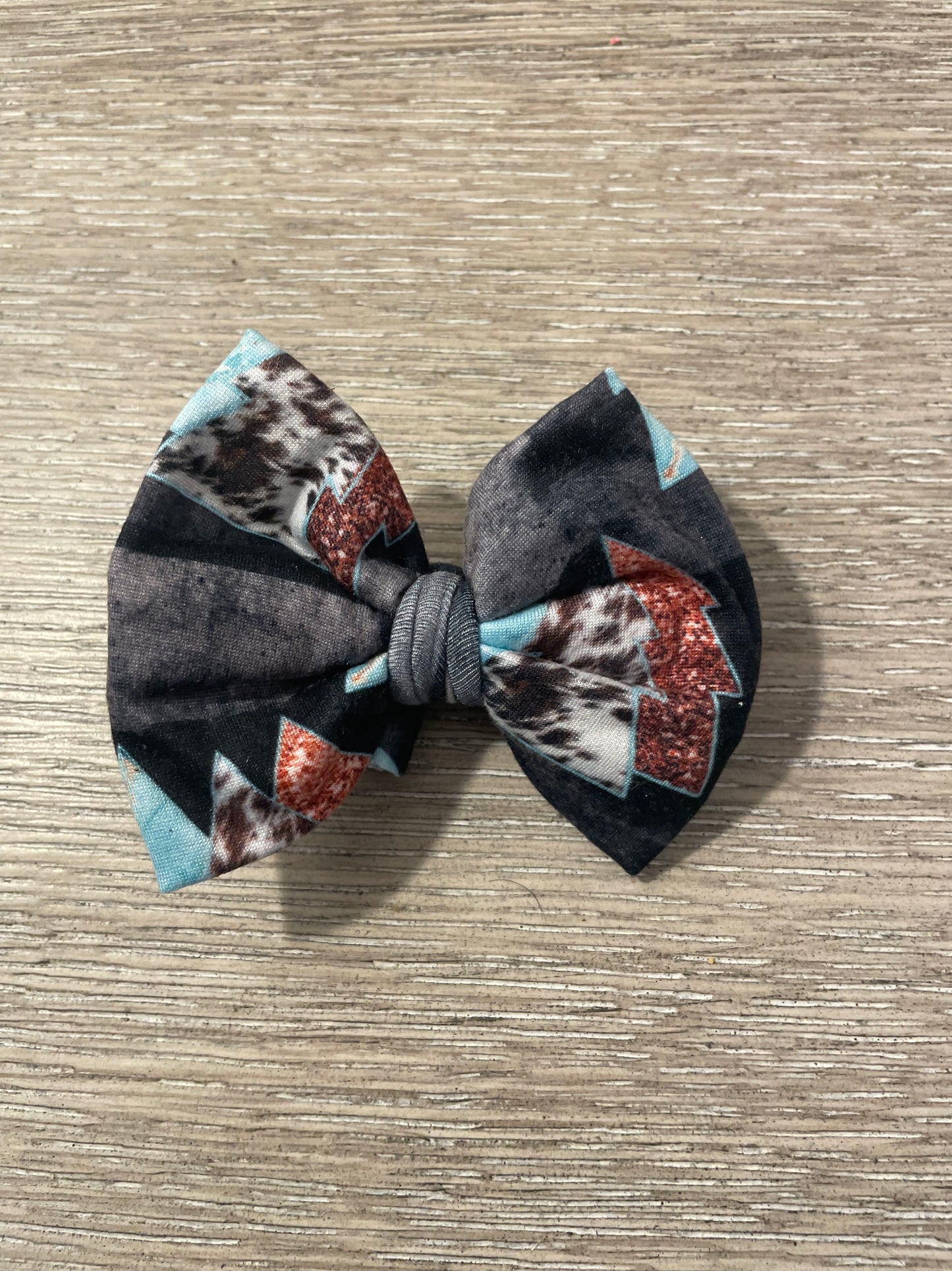 Winter cowhide trees clip bow