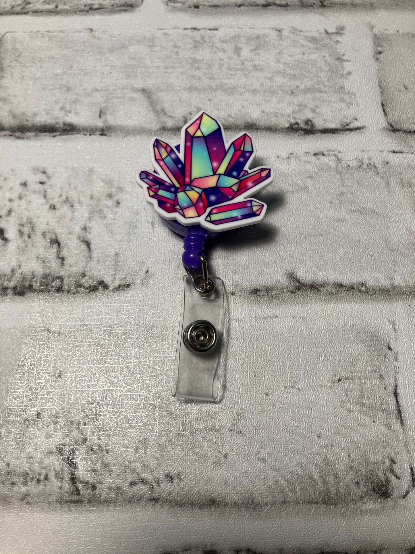 Crystals badge reel