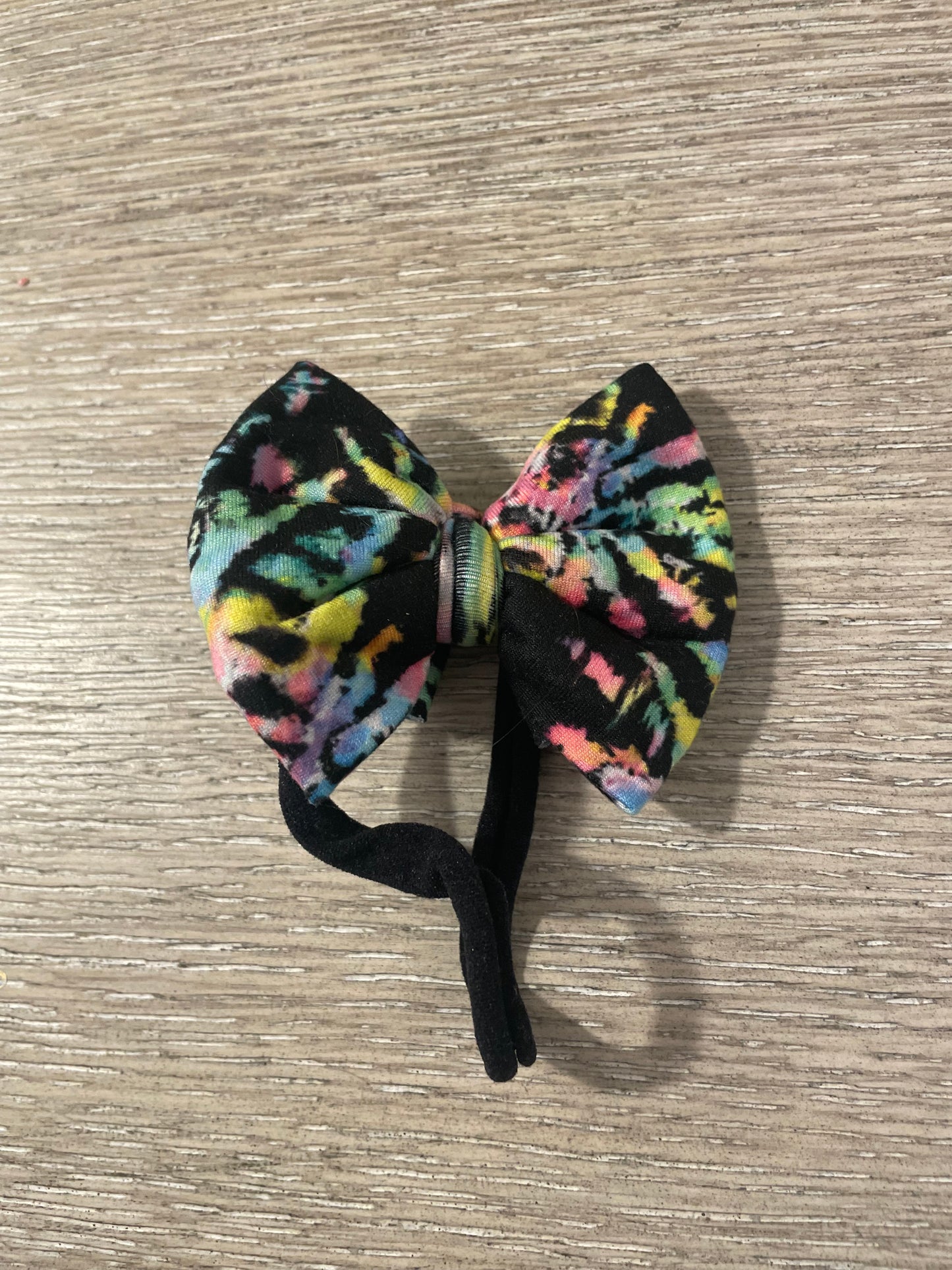 Reverse tie dye nylon bow