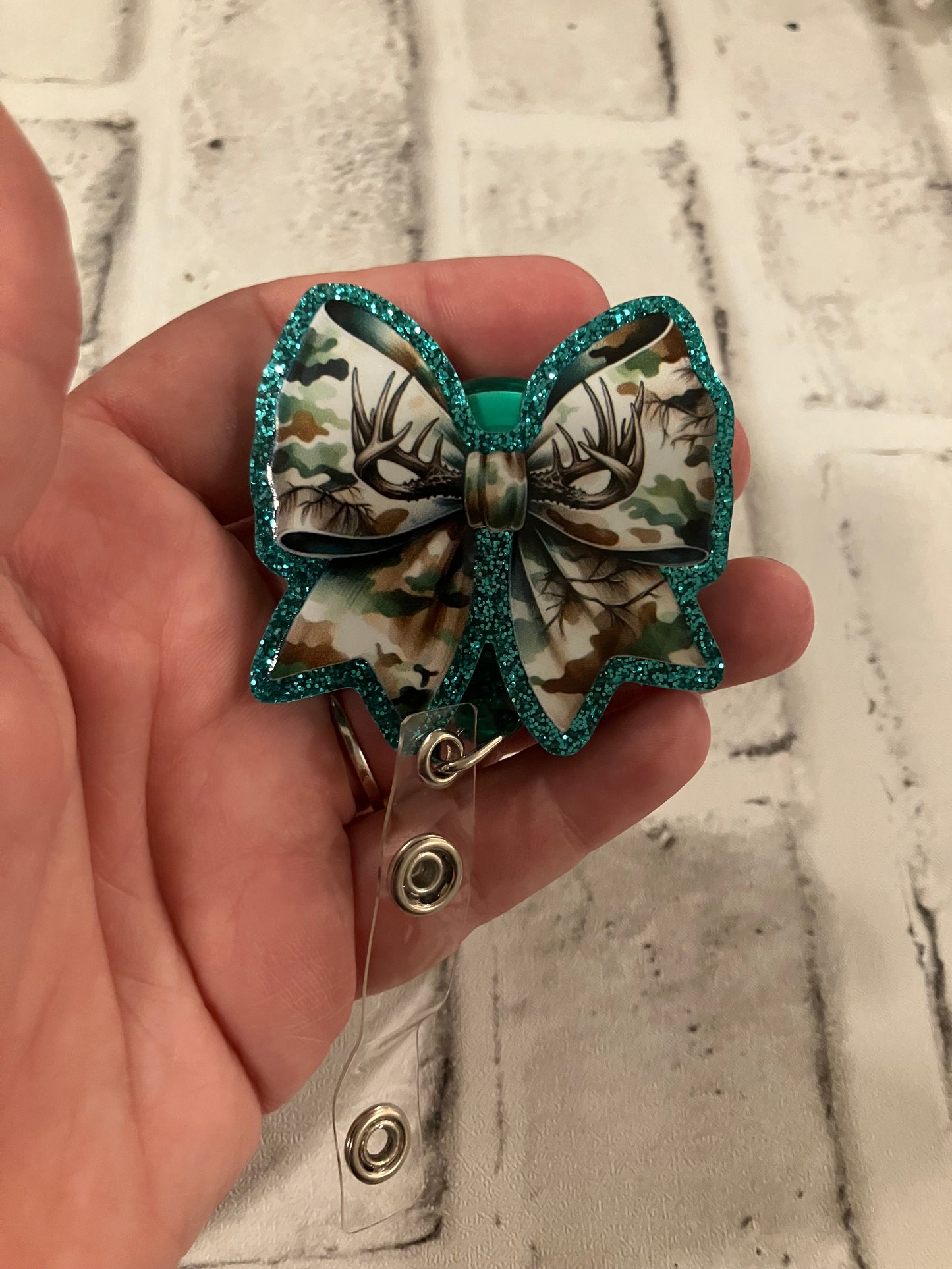 Camo bow badge reel