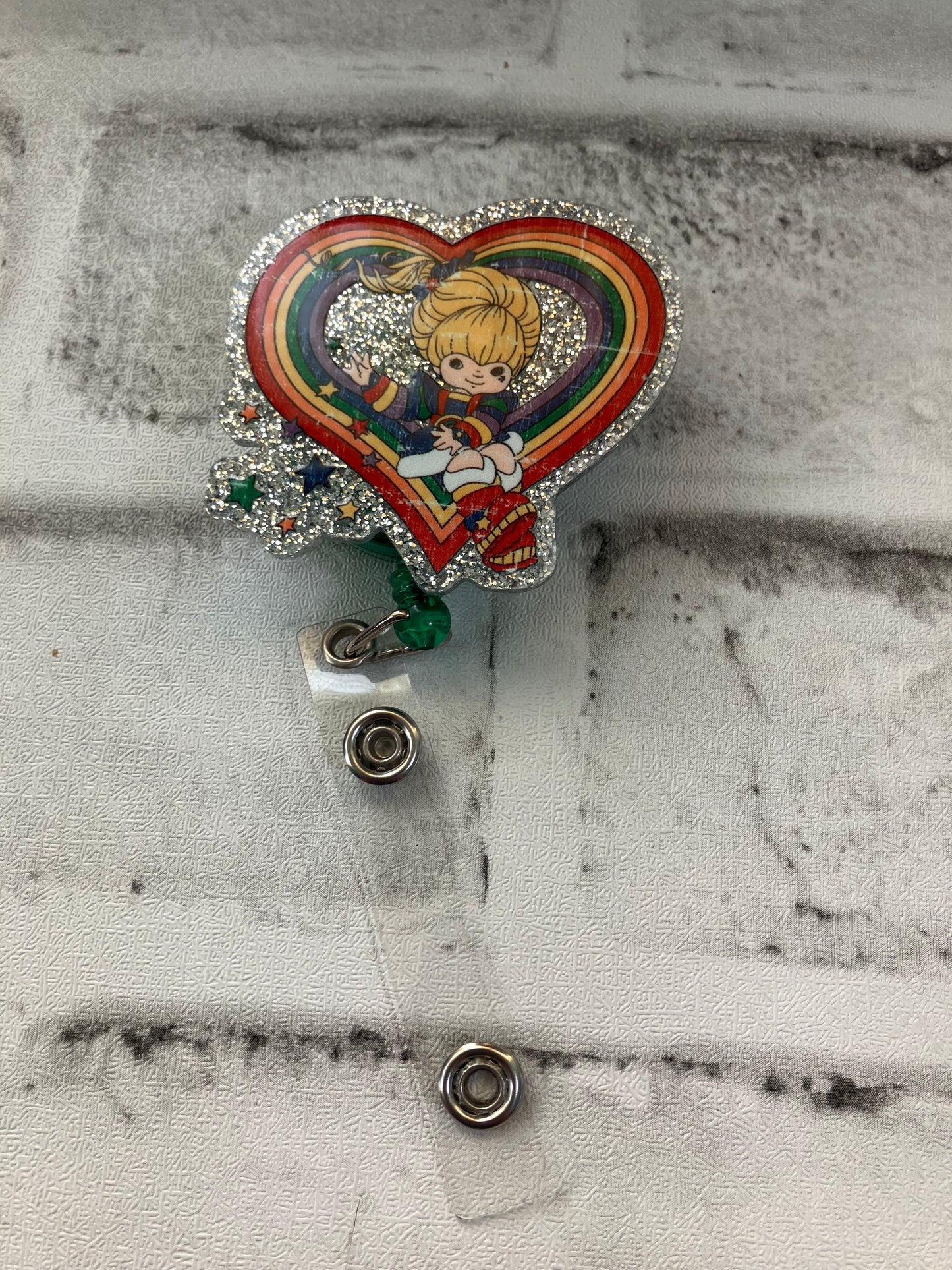Rainbow brite badge reel