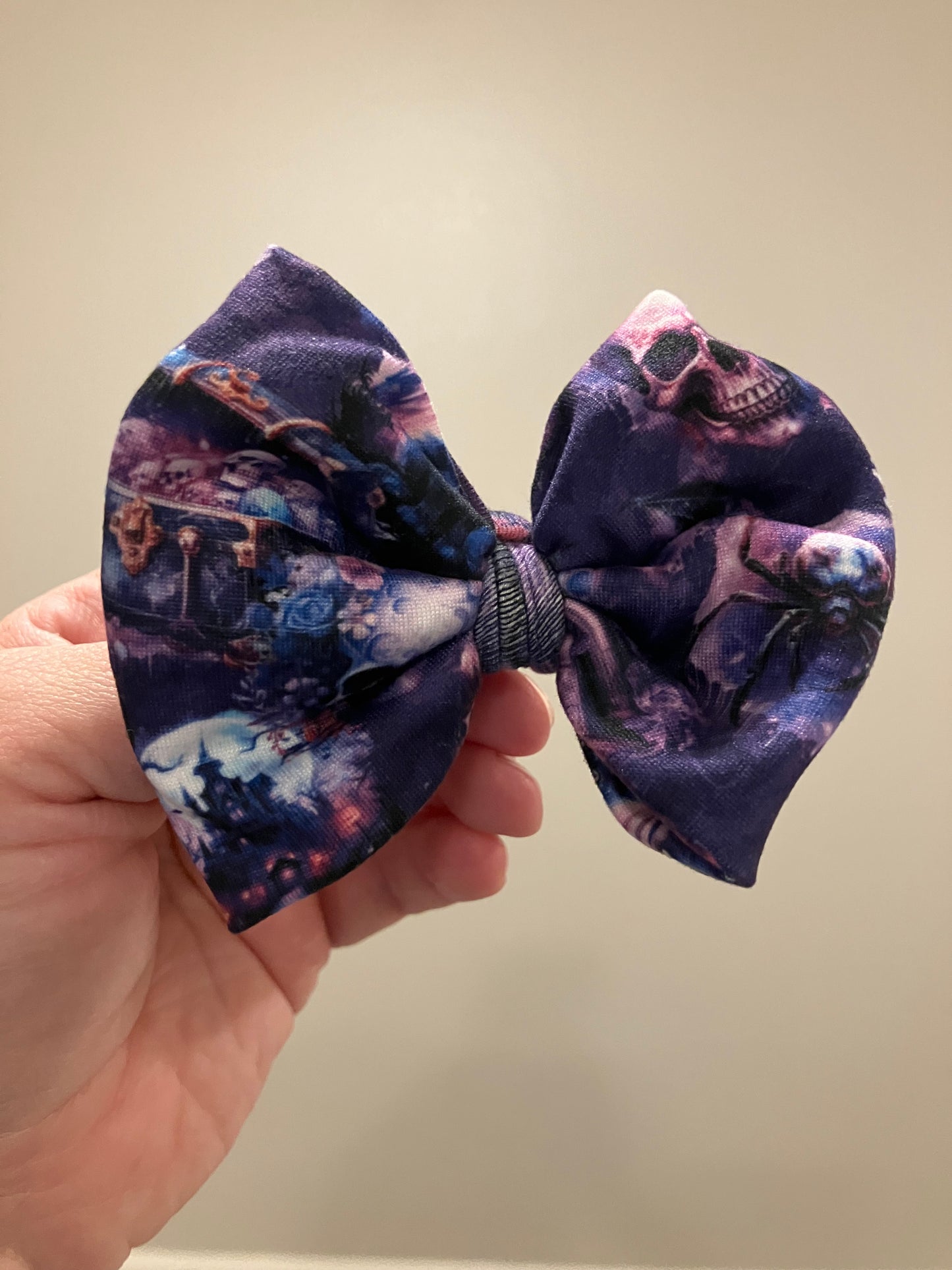 Purple skulls clip bows