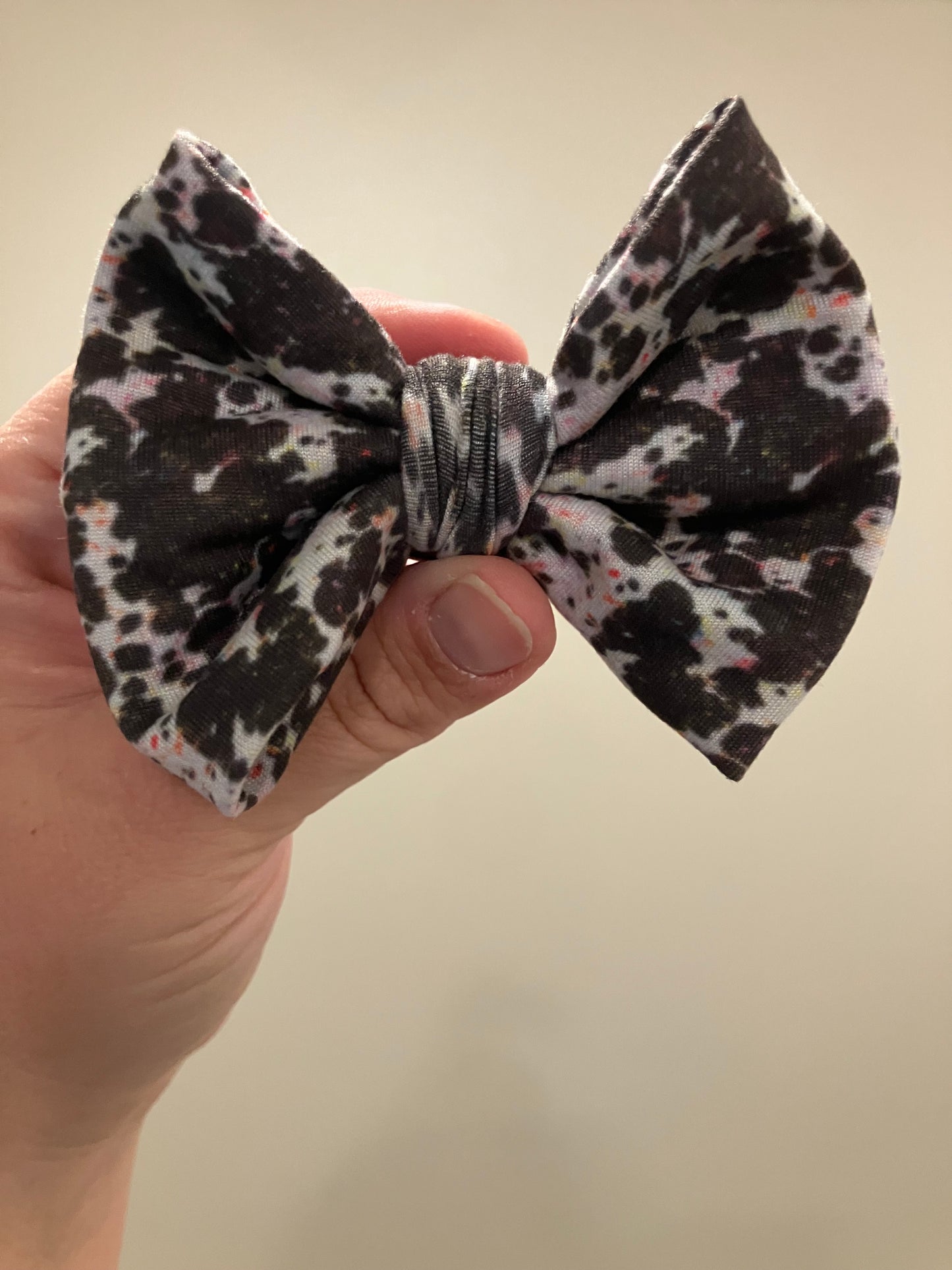 Cow paint splatter clip bows