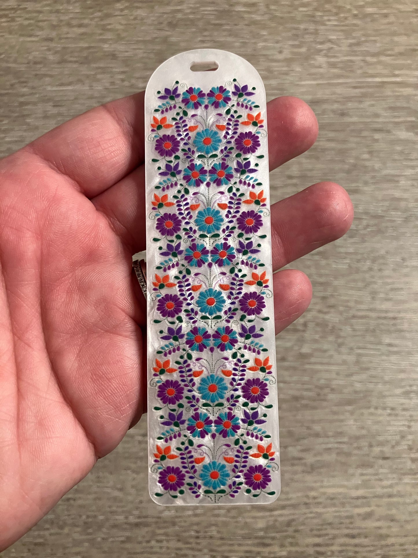 White with teal floral bookmark