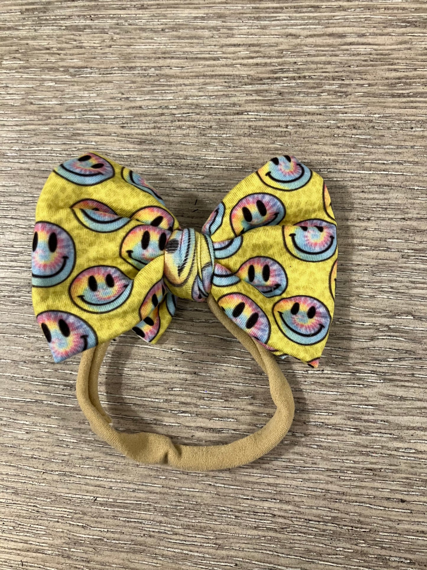 Yellow smiley nylon bow