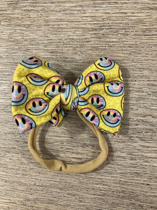 Yellow smiley nylon bow