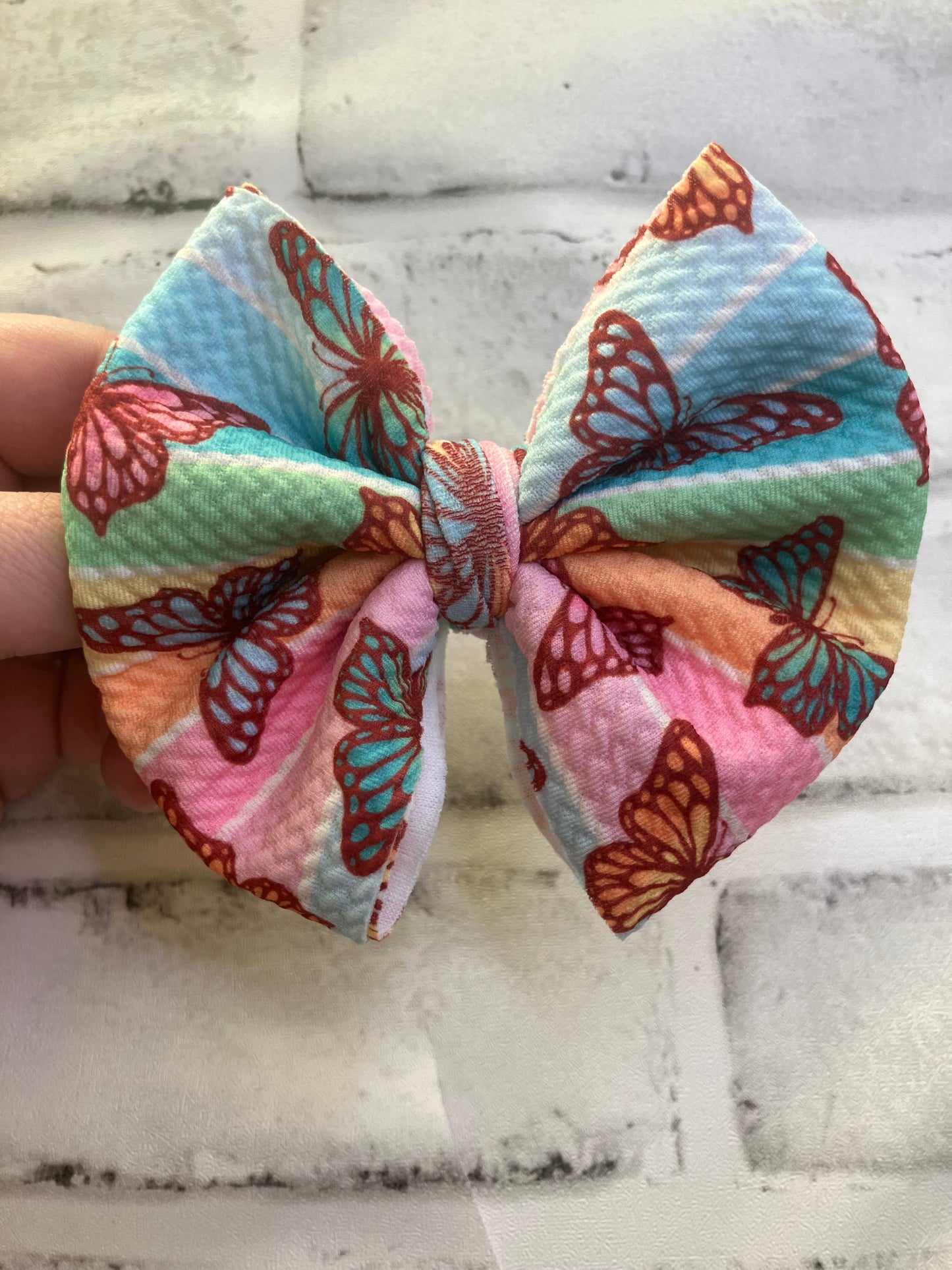 Butterfly rainbow clip bow