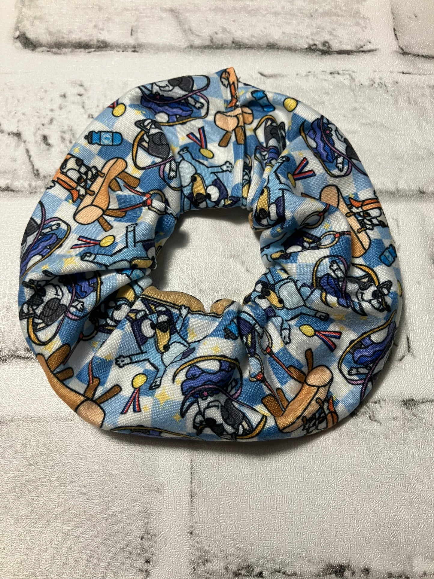 Blue dog gymnastics scrunchies