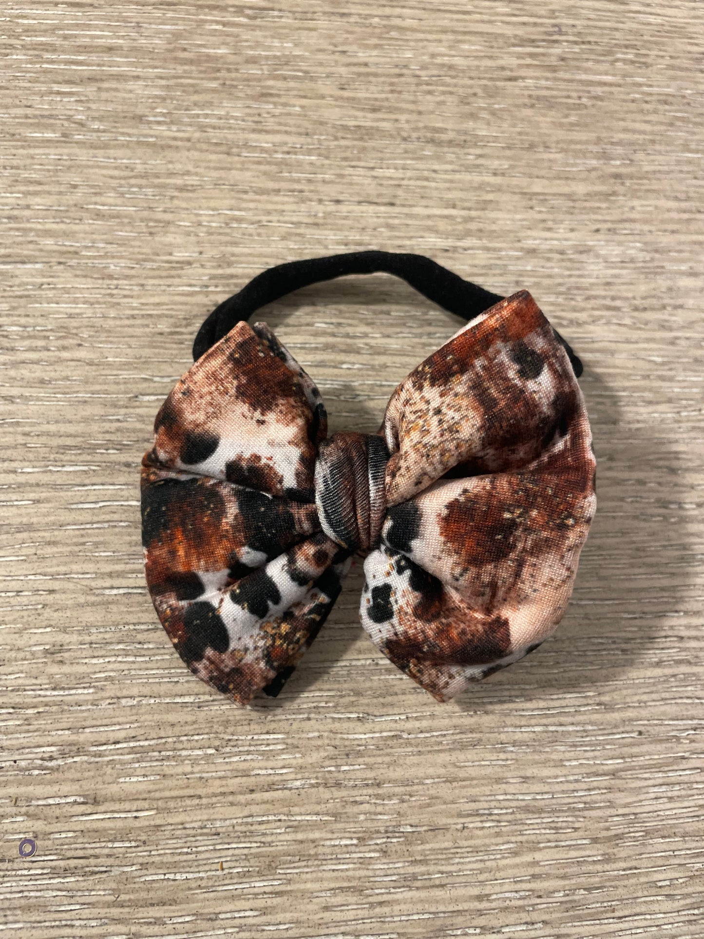 Cow gold flakes nylon bow