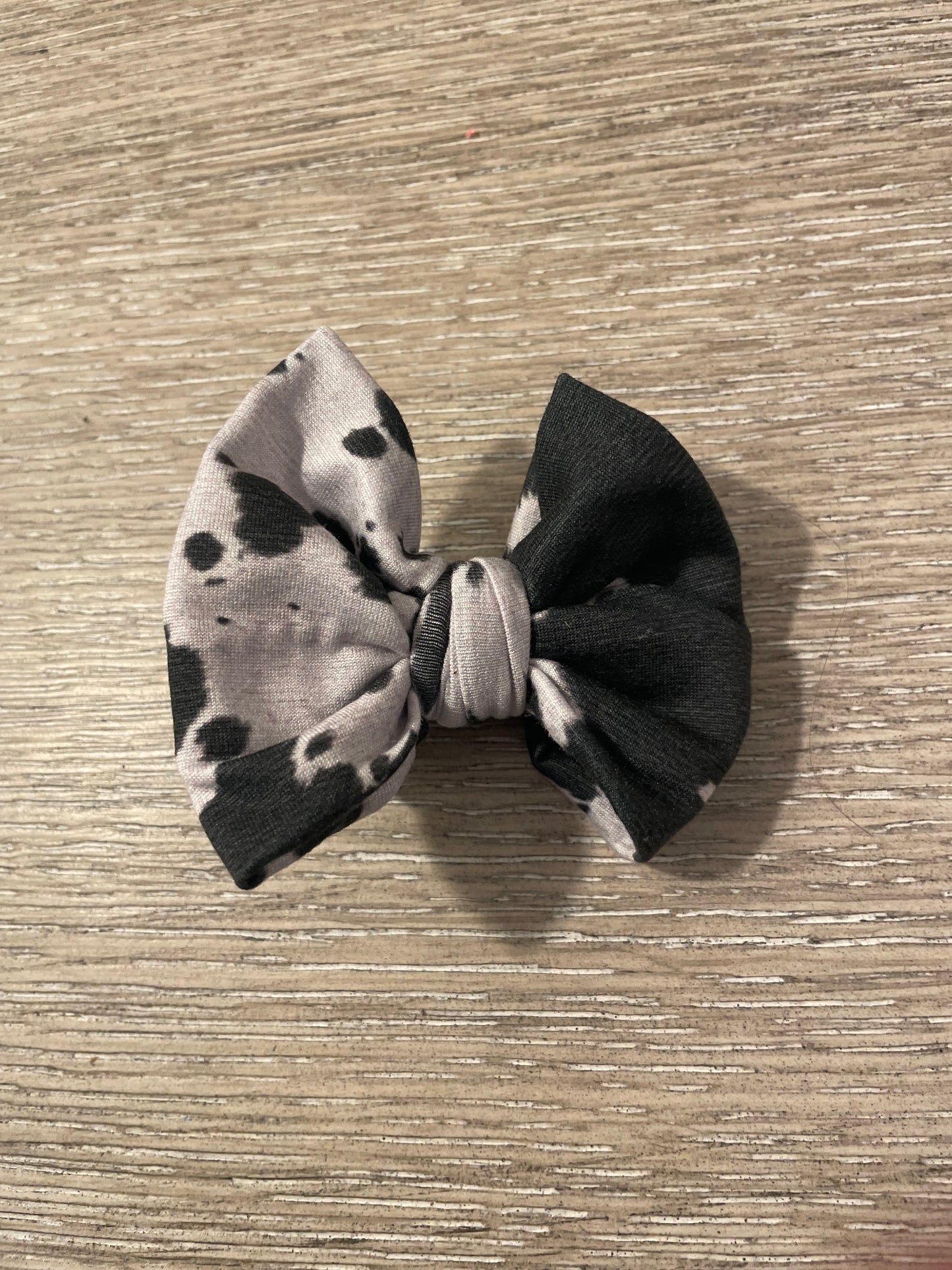 Black cow clip bows