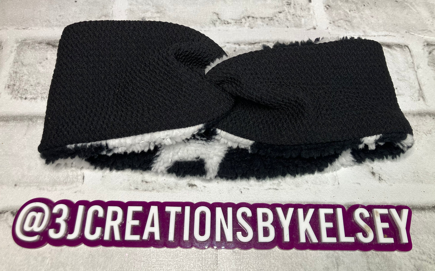 Black with cow child ear warmers🪩