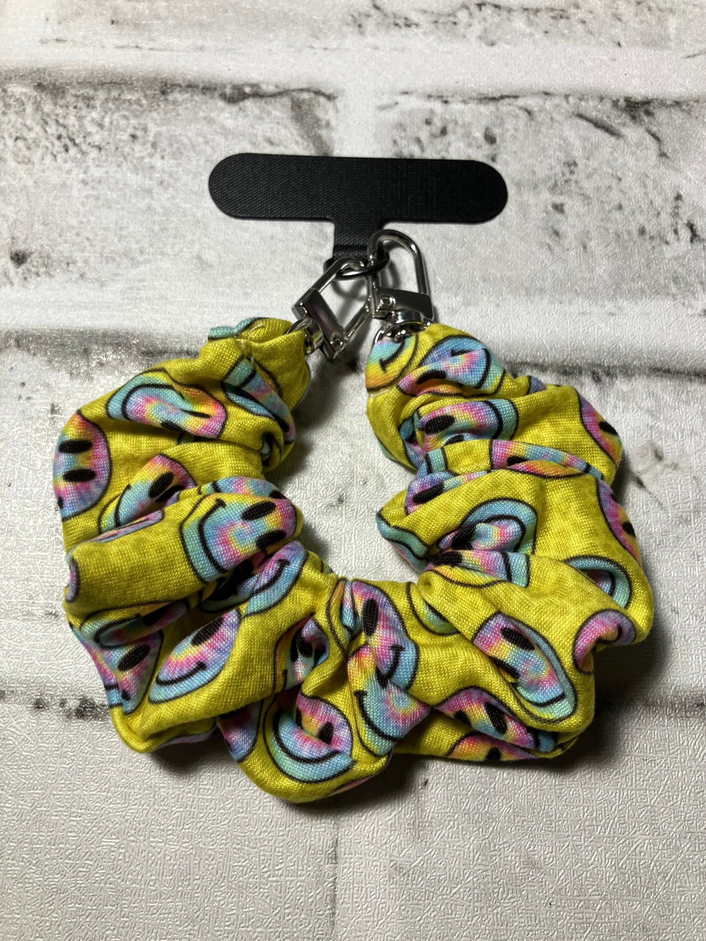 Yellow smiley scrunchie keychains phone holders