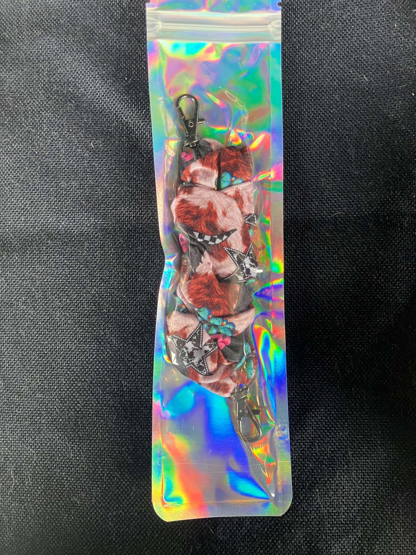 Western turquoise cow scrunchie phone holder