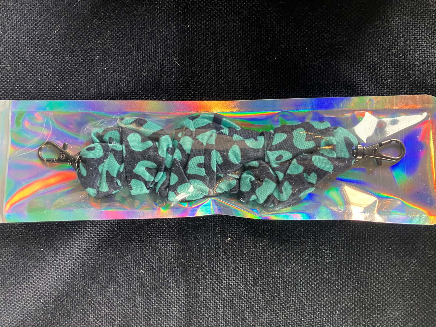 Teal leopard scrunchie phone holder