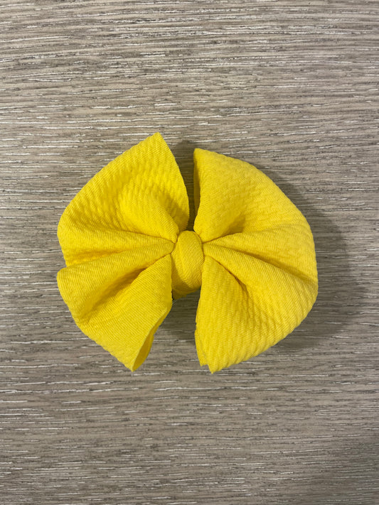 Yellow clip bow