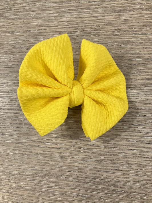 Yellow clip bow