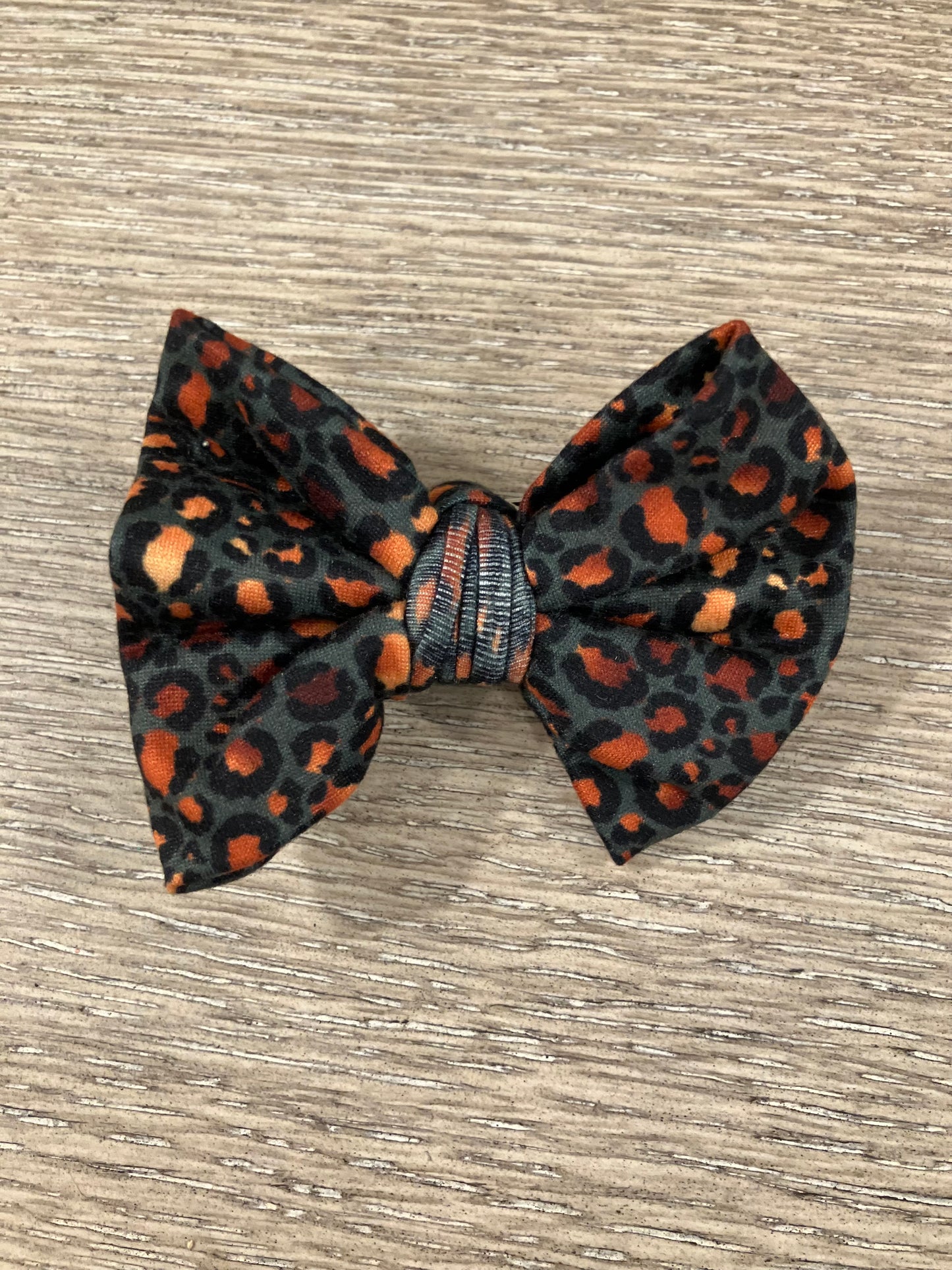 Teal gold leopard clip bow