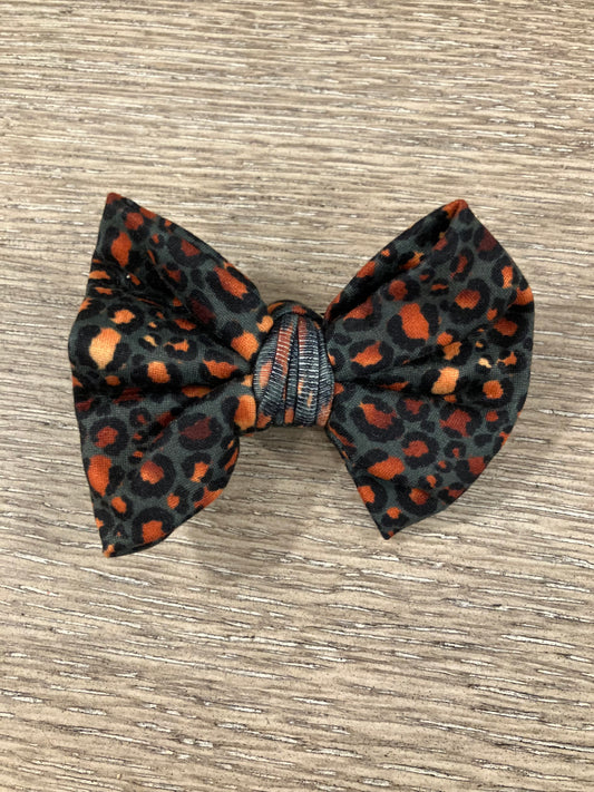 Teal gold leopard clip bow