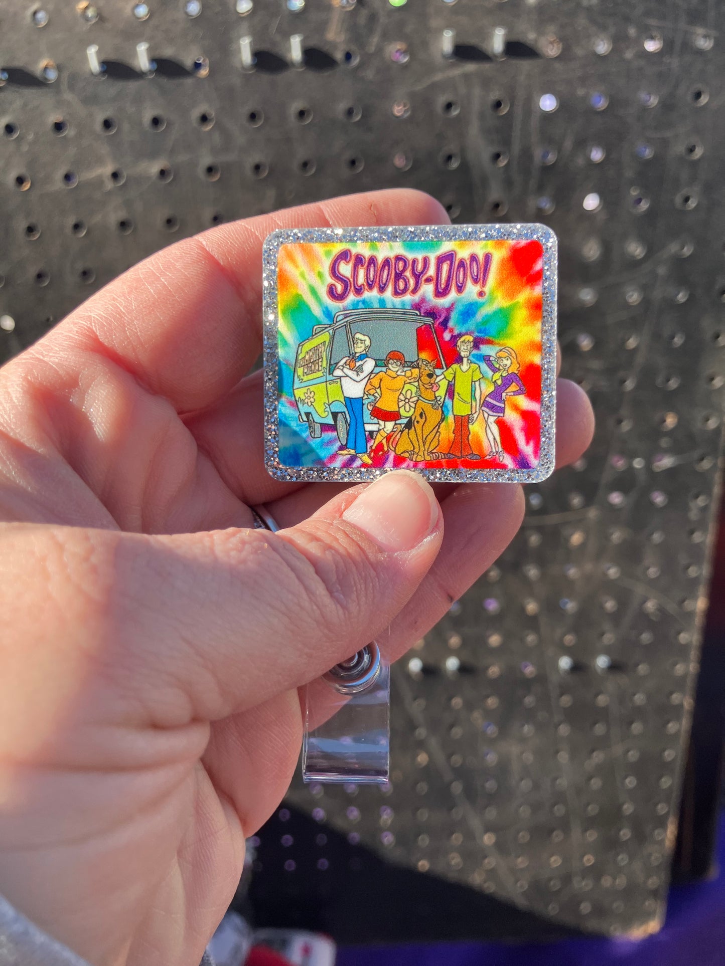 Mystery machine badge reel