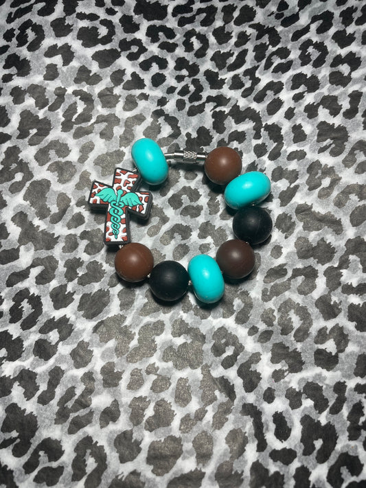 Cow medical cross tumbler charm