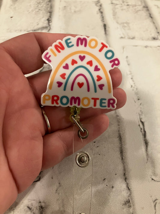 Fine motor promoter badge reel