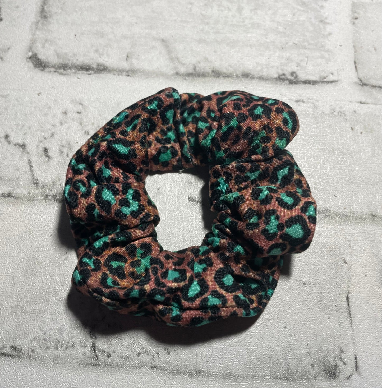 Teal leopard scrunchies