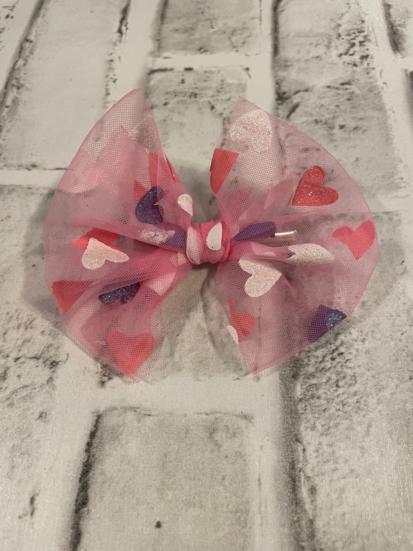 Pink mesh hearts clip bows