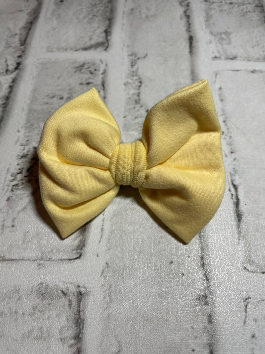 Yellow banana clip bows