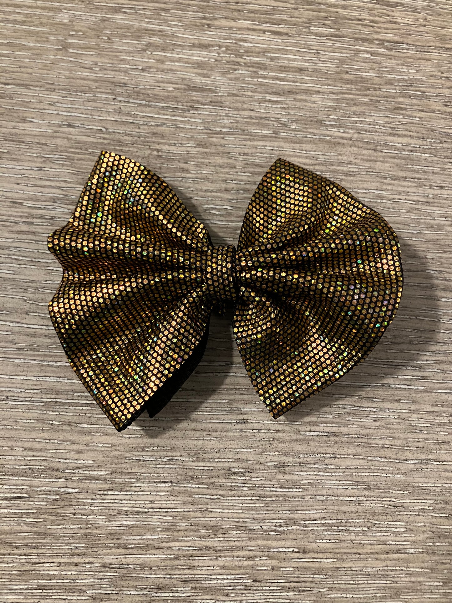 Gold sparkle clip bow