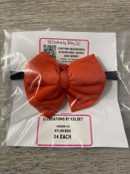 Orange nylon bow