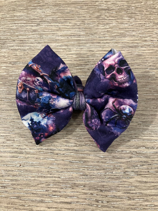 Purple skull clip bow