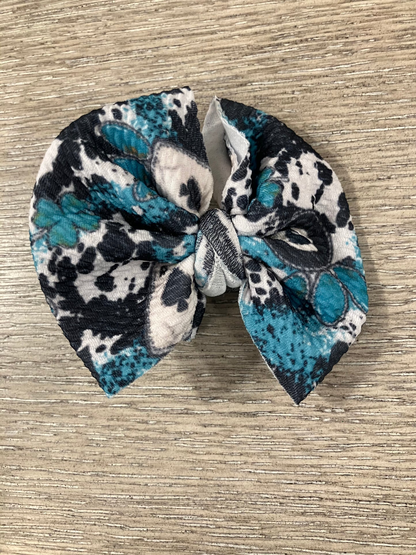 Cow teal eight ball clip bow