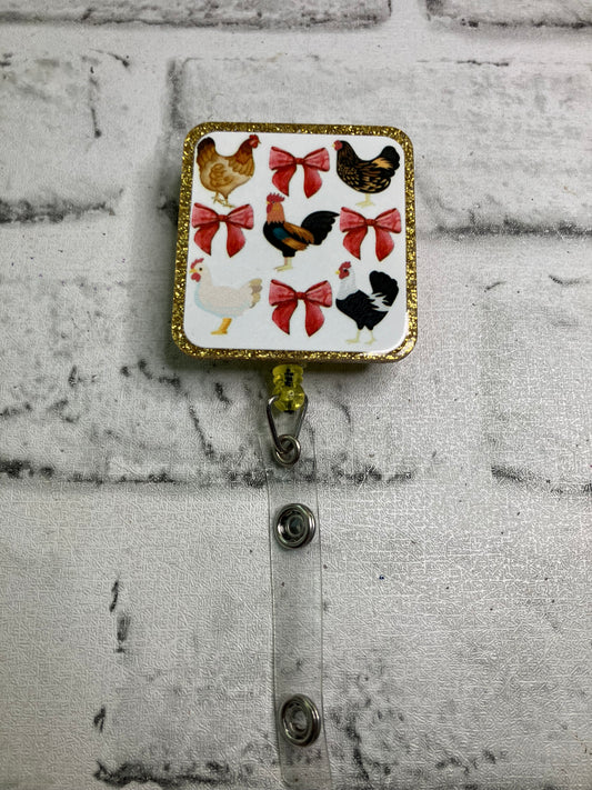 Chicken bows badge reel