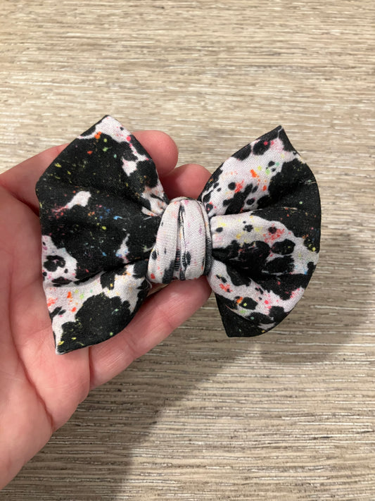 Cow paint splatter clip bow