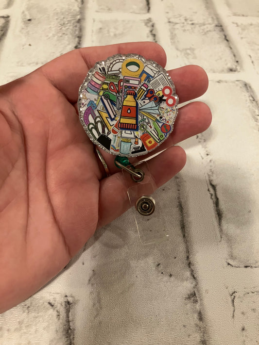 School supplies badge reels