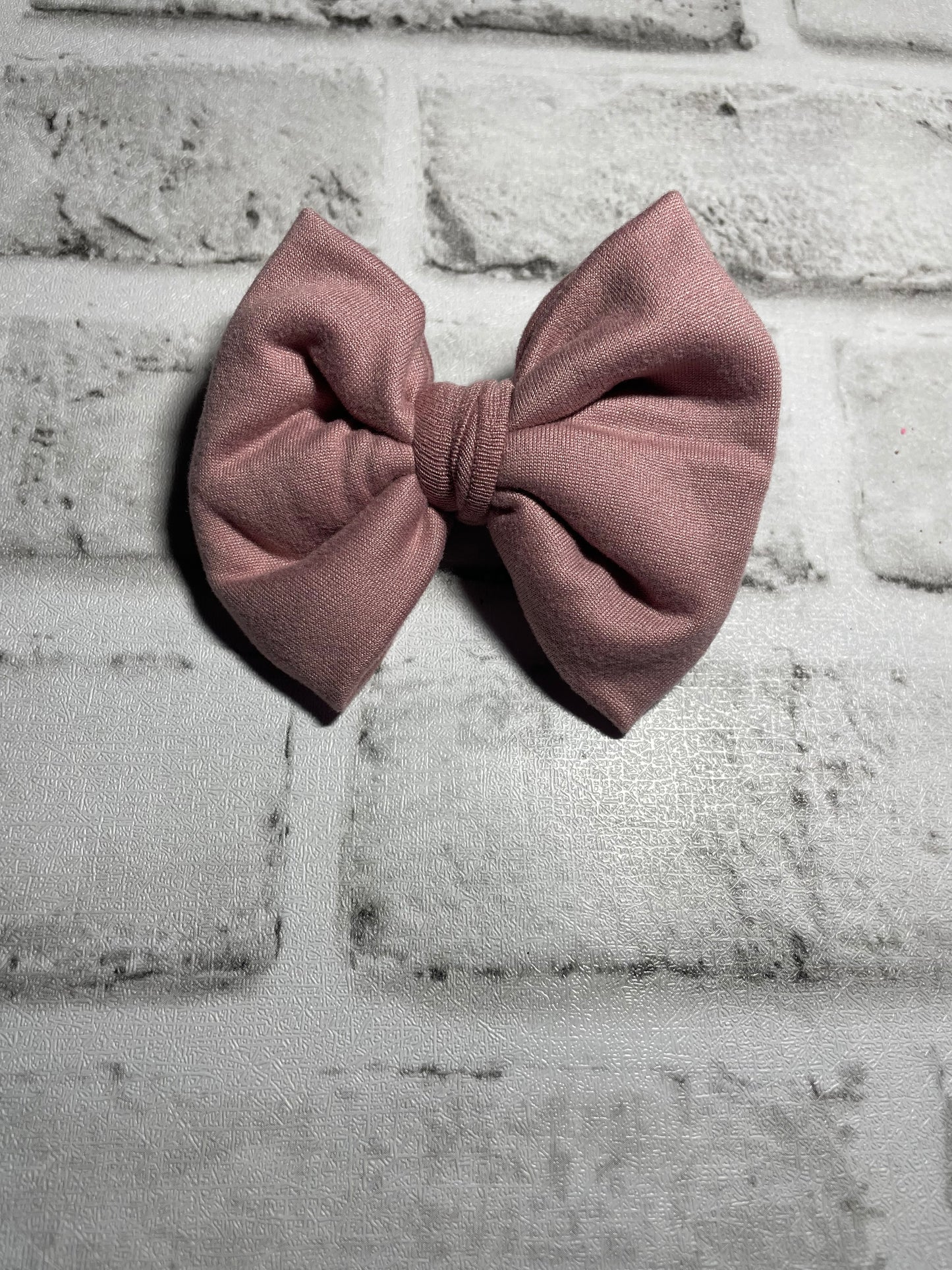 Mauve clip bows