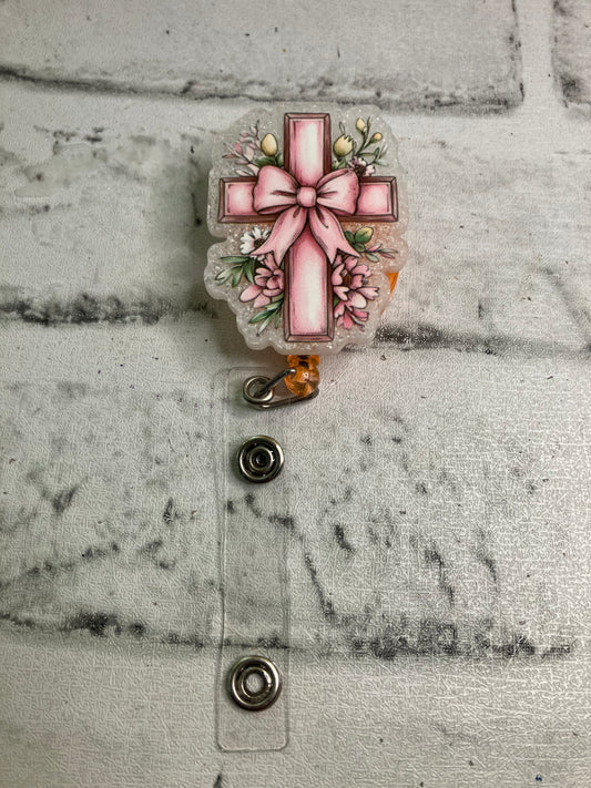 Pink cross badge reel