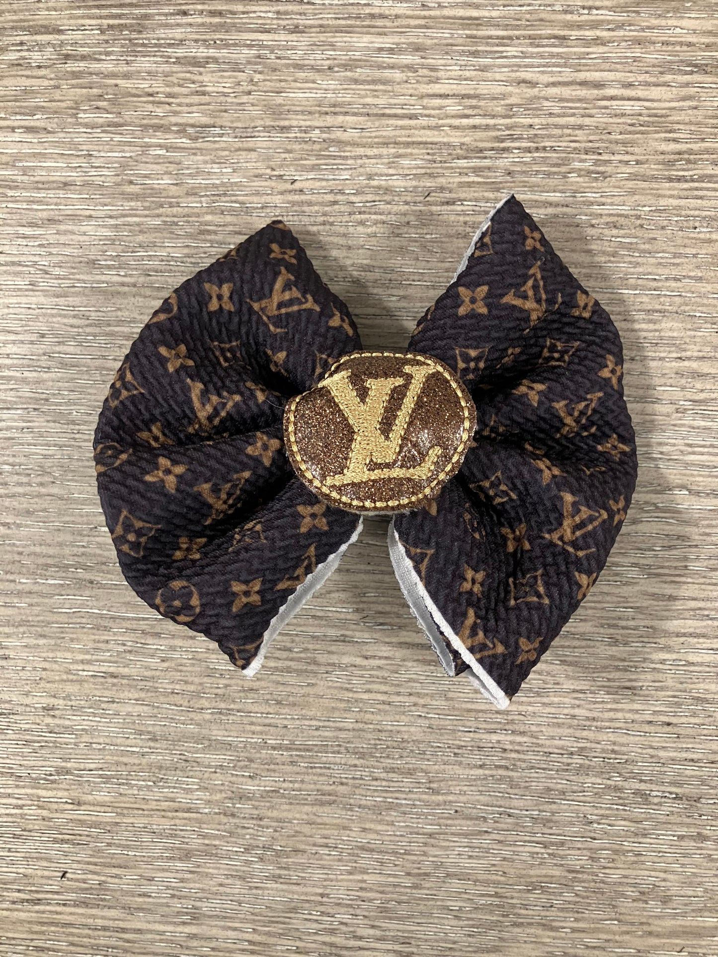High end brown clip bow