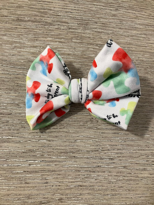 Puzzle piece clip bow