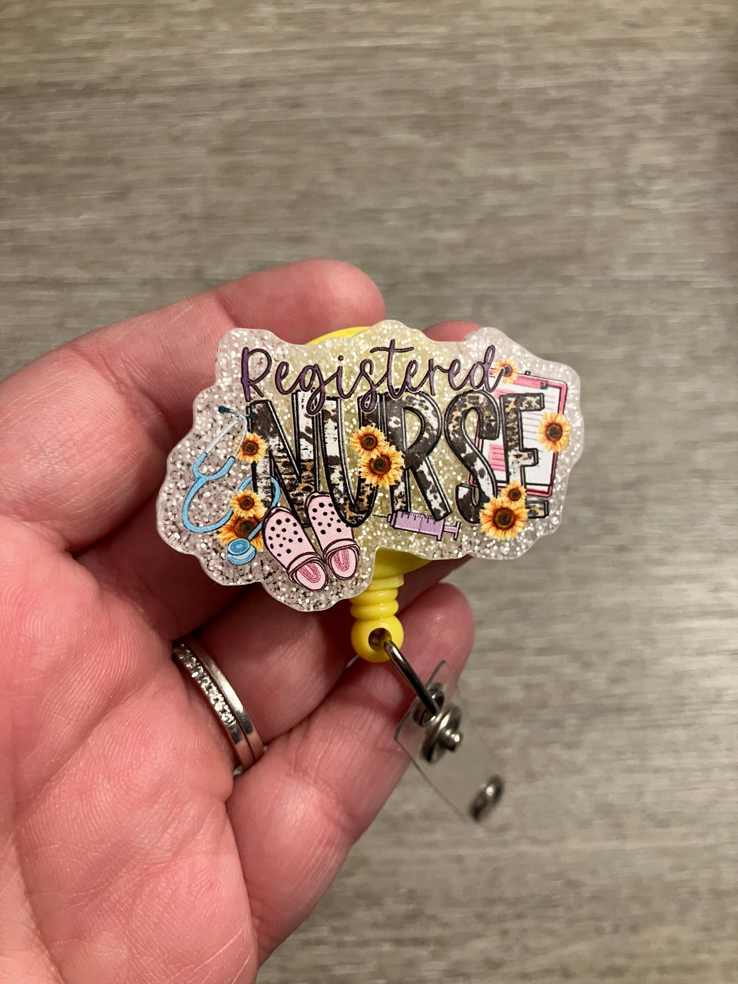 Registered nurse sunflower badge reel